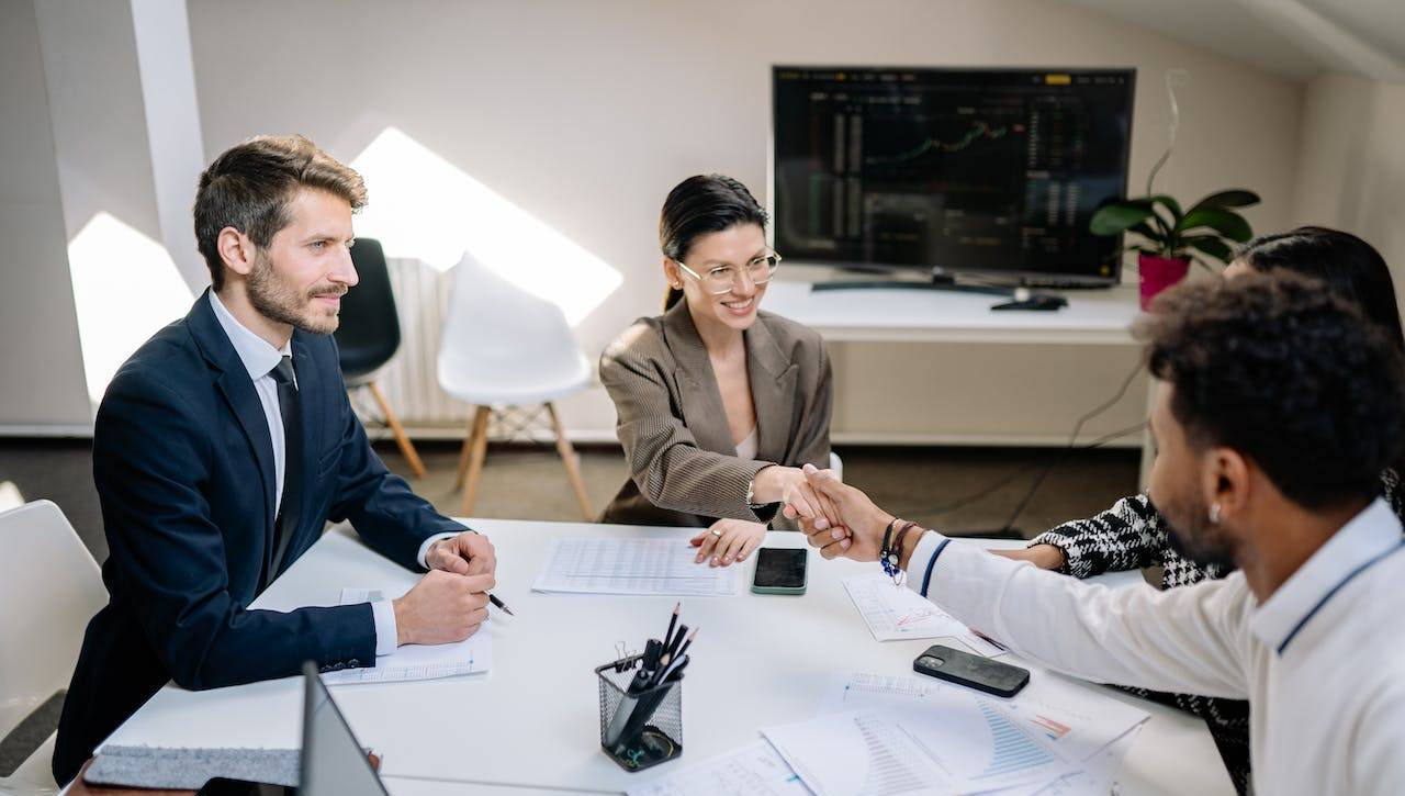 Incorporated business owner reviewing salary versus dividend pay options with RRSP documents