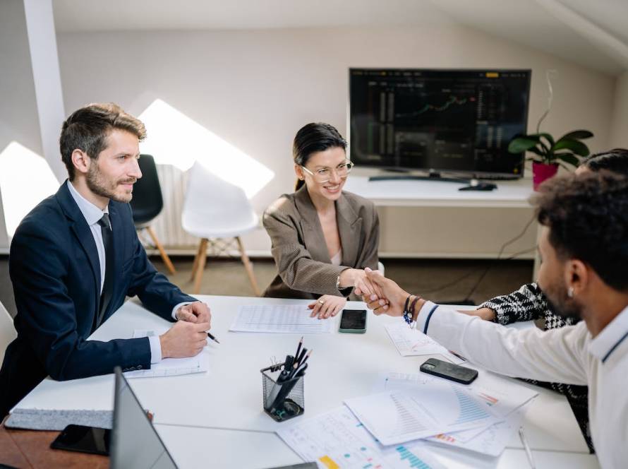 Incorporated business owner reviewing salary versus dividend pay options with RRSP documents