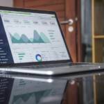 Investor reviewing ETF options on a laptop